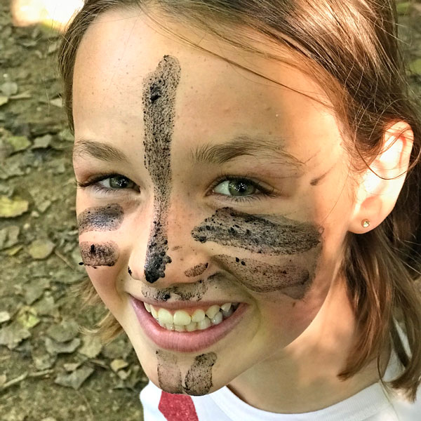 Girl with tribal face paint